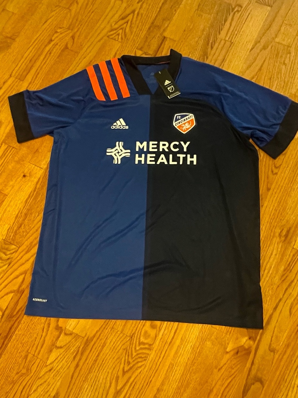 adidas FC Cincinnati Split Blue/Navy Soccer Jersey with Orange Shoulder Stripes